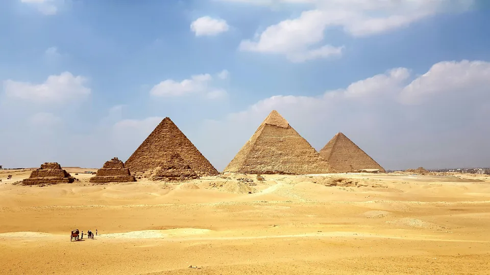 Egyptian pyramids rising above the desert